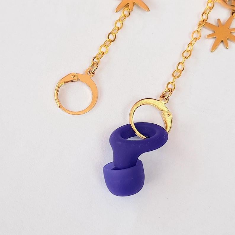 This image shows a close up of the leverback hooks which are attached to the end of the earring chains and are designed to open on a hinge and close back to keep the loop earplugs secure.