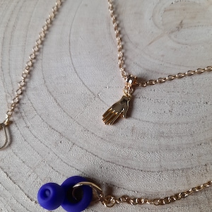 Dainty gold hand charm loop earplug necklace - gold chain with earplug holder clips - lightweight ear plug holder chain jewellery -