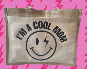 Cool Mom Bag - jute tas met voorvak