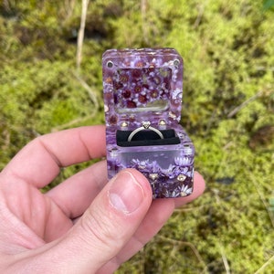 epoxy ring box
ring box proposal
ring box
engraved jewelry box
ring box nature
bridal ring box
flower ring box
engagement ring box
ring box proposal
proposal ring box
purple ring box
ring holder
ring box