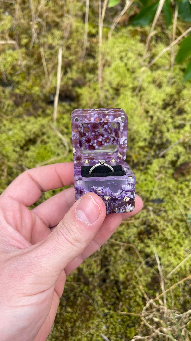 epoxy ring box
ring box proposal
ring box
engraved jewelry box
ring box nature
bridal ring box
flower ring box
engagement ring box
ring box proposal
proposal ring box
purple ring box
ring holder
ring box
