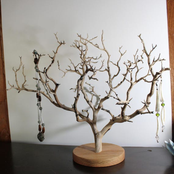 Jewelry display stand made from a real tree branch