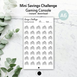 May include: A printable A6 sheet with a savings challenge theme. The sheet features a black and white illustration of a video game controller repeated 49 times. The text "Savings Challenge" and "Gaming Console" is at the top of the sheet. The text "Goal" is at the top right of the sheet.
