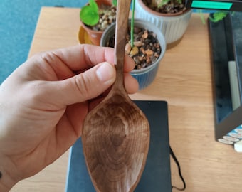 Hand carved wooden eating spoon
