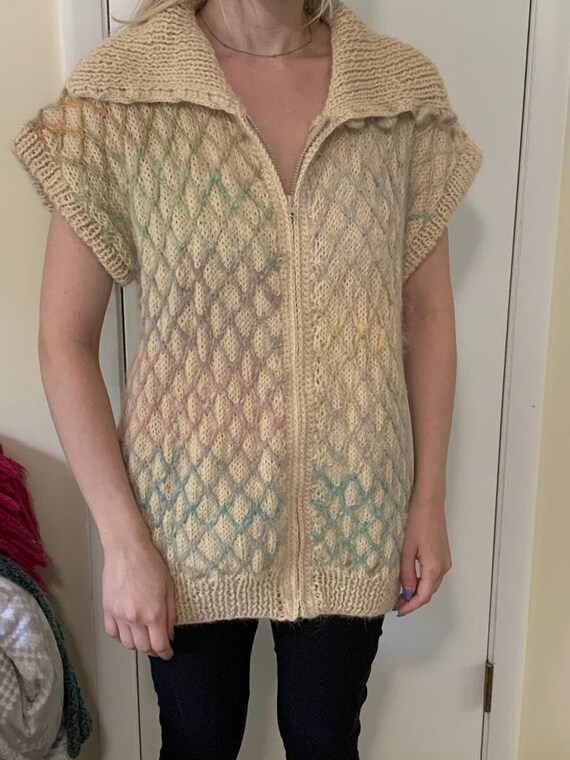 Close Out**sale 100.00**SALE**150.00**HANDMADE KNITTED Vest