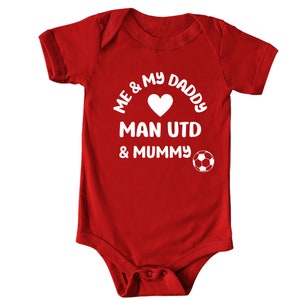 Man utd baby grow cheap argos
