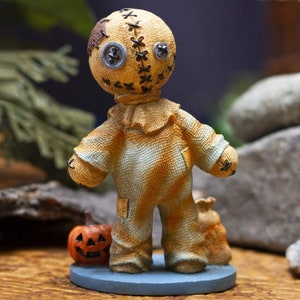 ハロウィーンのトリックオアトリートかかしの置物、モンスター、気まぐれなカボチャの頭