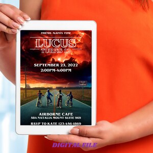May include: Digital invitation for a 12th birthday party with a Stranger Things theme. The invitation features a red and orange sunset sky with lightning, a road with four figures riding bikes, and the text "FRIENDS ALWAYS COME LUCUS TURNS 12 SEPTEMBER 23, 2022 2:00PM-4:00PM AIRBORNE CAFE 584 NATALIA MOUNT SUITE 969 RSVP TO KATE 123-456-1869".