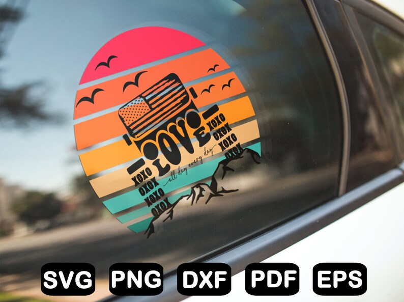 May include: A round sticker featuring a sunset backdrop and a silhouette of a Jeep with the word "LOVE" in a retro typeface. The text "all day every day" is written beneath the Jeep. The sticker is displayed on a car window.