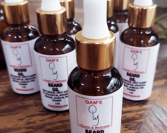 QAM'S Beard Oil is an all natural moisturizer that detangles your beard for a healthy looking beard