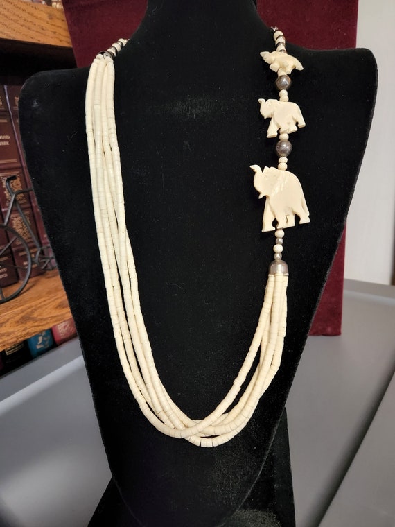 CARVED BONE ELEPHANT necklace Gem