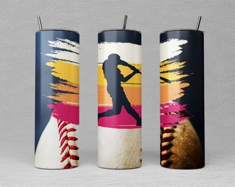 May include: A set of three stainless steel tumblers with a baseball theme. Each tumbler features a different design element: a baseball, a batter silhouette, and a baseball with a textured surface. The background includes brushstroke designs in shades of blue, yellow, and pink.