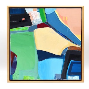 May include: An abstract painting in a light wood frame featuring bold, flat shapes in shades of green, blue, black, yellow, and peach. The composition consists of layered, geometric, and organic color blocks with visible brushwork and texture.