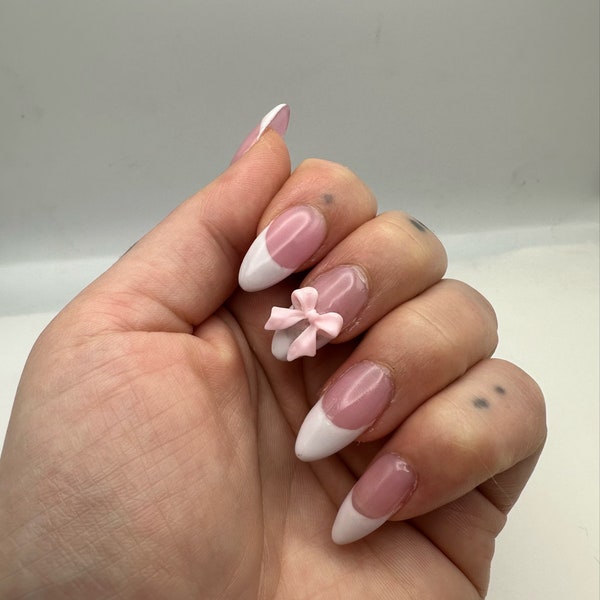 press on nails french tip almond nails with bow charm