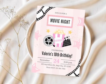 May include: A rectangular invitation card with a light pink striped background featuring a movie theme. Graphics include a film strip, a popcorn bucket, a film reel, and a clapperboard. Text reads: JOIN US FOR A MOVIE NIGHT, CELEBRATING Valerie's 10th Brithday!