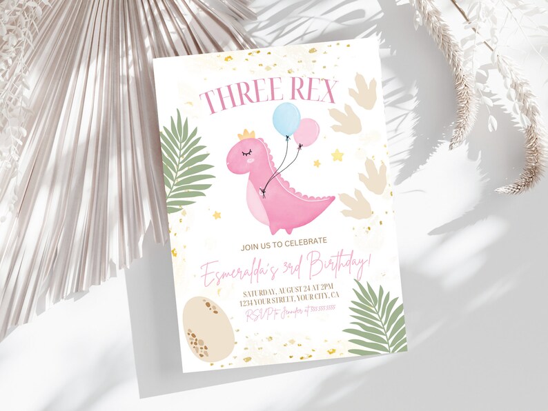 May include: A pink dinosaur with a crown and balloons, a gold egg, and green palm leaves on a white background with gold glitter. The text reads "Three Rex" and "Join us to celebrate Esmeralda's 3rd Birthday!"