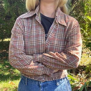 Vintage 70’s brown plaid jacket/blouse with gathered elastic cuff and hem.