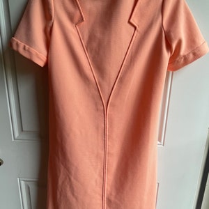 Vintage 1970’s light orange stylish dress size Medium