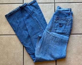 vtg 70’s bellbottom jeans with unique pockets sz 10