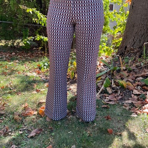 cuffed checked burgundy, gray and white bellbottoms from the 1970’s