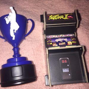 Trophy and Arcade Promo Stretch Goal pieces Street Fighter Miniatures Board Game