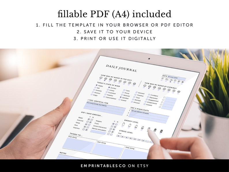Pode incluir: Um tablet digital exibindo um modelo de di&aacute;rio di&aacute;rio com se&ccedil;&otilde;es para rastreamento do humor, gratid&atilde;o e metas di&aacute;rias. O modelo &eacute; projetado para uso com uma caneta digital e inclui uma se&ccedil;&atilde;o para notas. O texto "EM PRINTABLES CO ON ETSY" est&aacute; na parte inferior da tela.