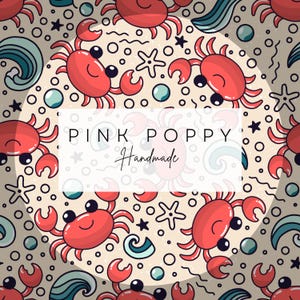May include: A seamless pattern featuring red crabs, blue waves, and white starfish on a beige background. The text "PINK POPPY Handmade" is in a white rectangle.