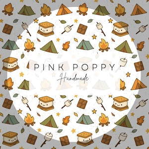 May include: A white background with a circle in the center. The circle contains the text "PINK POPPY Handmade" and is surrounded by a pattern of camping-themed illustrations. The illustrations include tents, campfires, marshmallows, chocolate bars, and stars.