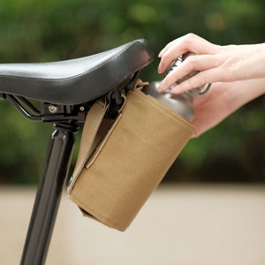 Saddle-mounted water bottle holder for Brompton