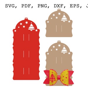 May include: A red and brown Christmas-themed hair bow holder with a cutout design of a Christmas tree and stars. The holder is designed to hold two hair bows. The hair bow is red and gold with a Christmas tree design.