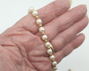 A vintage faux pearl bracelet, a gold plate bracelet, a bracelet by the French designer PIERRE CARDIN, length 17 cm, a perfect gift for her
