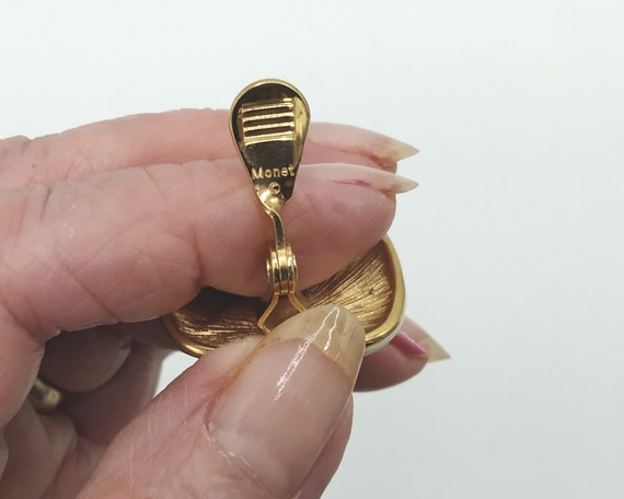 Vintage clip earrings, Monet 22 ct gold plate & e… - image 9
