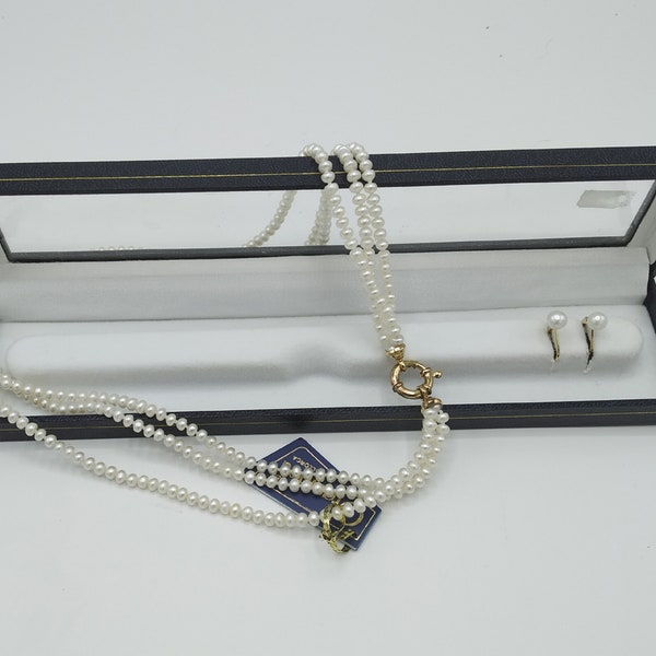 An Orquidea Mallorca 3 strand pearl necklace and earring set 1980s. In the original box & never worn. What a gift for your loved one.