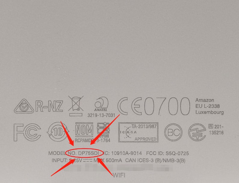 May include: Close-up of a white device with various certifications and regulatory markings, including FCC ID: S5Q-0725, IC: 10910A-9014, and Model No. DP75SDI. The device also has a WiFi logo and text indicating input of 5V = 500mA.