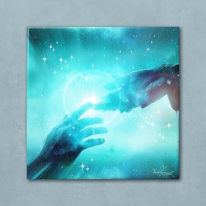 May include: A square canvas print depicting two hands almost touching in a celestial scene. The hands are painted in blue and purple hues, with a bright light at the point of contact. The background is a starry sky with numerous small, white stars.