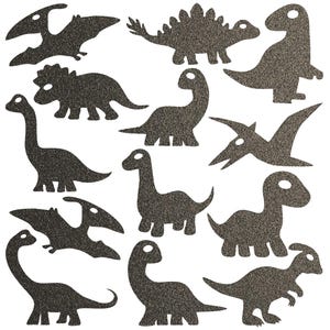 Könnte beinhalten: Eine Sammlung glitzernder, dunkelgrauer Dinosaurier-Ausschnitte in verschiedenen Formen und Größen. Das Set enthält verschiedene Arten, wie Stegosaurus, Triceratops und Pterodactyl, perfekt für Bastel- oder Dekorationsprojekte.