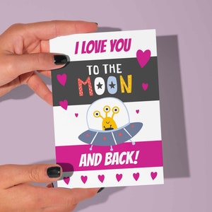 Tarjeta imprimible de amor y amistad con temática espacial para niños con la frase "¡Te amo hasta la luna y más allá!"