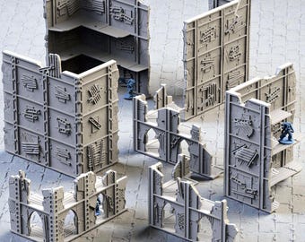 Terreno disperso de ruinas urbanas: edificios modulares destruidos para juegos de rol de mesa, juegos de guerra postapocalípticos y D&D.