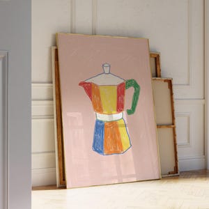 May include: A framed wall art print featuring a crayon-style drawing of a moka pot coffee maker. The coffee maker is rendered in vibrant blocks of red, yellow, orange, blue, and green against a solid, muted dusty pink background.