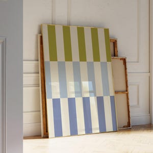 May include: A framed abstract art print with a geometric pattern of vertical stripes in shades of green, blue, and white.