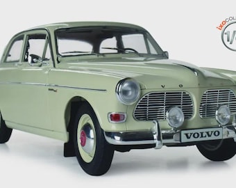 Kit de modelismo Volvo 122S Amazon IXO a escala 1:8 con luz y sonido – Kit de coche de colección premium de 892 piezas.