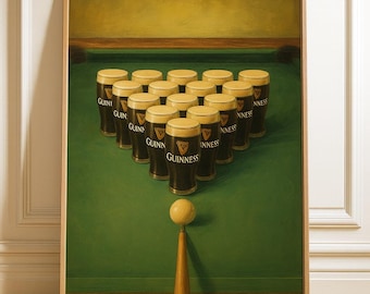 May include: A framed print depicts a billiards table with a unique twist. Instead of billiard balls, the rack is filled with Guinness pint glasses. A cue ball and cue stick are positioned at the bottom, ready to break the rack.