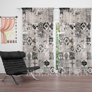 May include: A pair of black and white patterned curtains with a geometric design. The curtains are hung on a white wall and there is a black chair in the foreground.