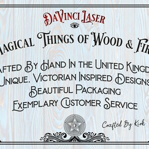 May include: A blue and white woodgrain background with a black and white image of a pentagram. The text "DaVinci Laser" is in red and black. The text "Magical Things of Wood & Fire" is in black. The text "Crafted by Hand in the United Kingdom" is in black. The text "Unique, Victorian Inspired Designs" is in black. The text "Beautiful Packaging" is in black. The text "Exemplary Customer Service" is in black. The text "Crafted by Kirk" is in black.