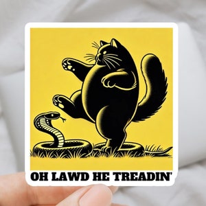 May include: A black cat with a yellow background, stepping on a snake with the text "OH LAWD HE TREADIN'" below the image.