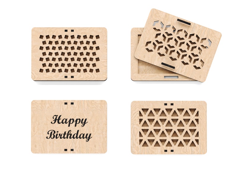 May include: A wooden box with a laser-cut design. The box is open and the lid is on top. The lid has a geometric pattern. The box has the words "Happy Birthday" written on the front.