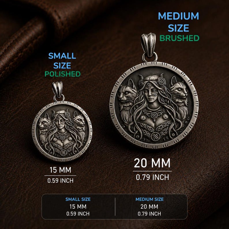 May include: Two circular silver-toned pendants featuring a central female figure flanked by two cats. The small pendant is labeled 15 mm (0.59 inch) and polished, while the medium pendant is labeled 20 mm (0.79 inch) and brushed. Both have bails.