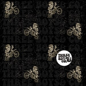 May include: A repeating pattern on a black background featuring a skeleton riding a motorcycle and giving a peace sign. The skeleton wears a baseball cap. The image also includes the text "THREE BOYS & CO."