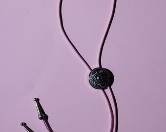 Silver Concho Bolo Tie with a light pink cord - brightly coloured cord bolo tie