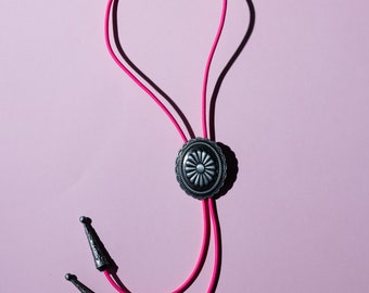 Silver Concho Bolo Tie with a neon pink cord - brightly coloured cord bolo tie